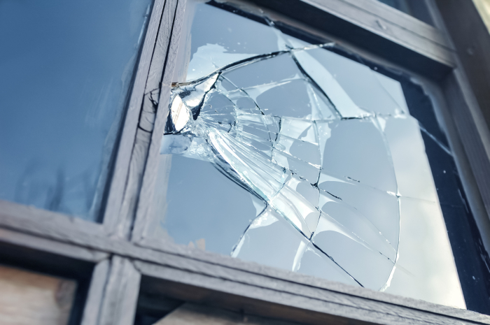 broken window with shattered glass